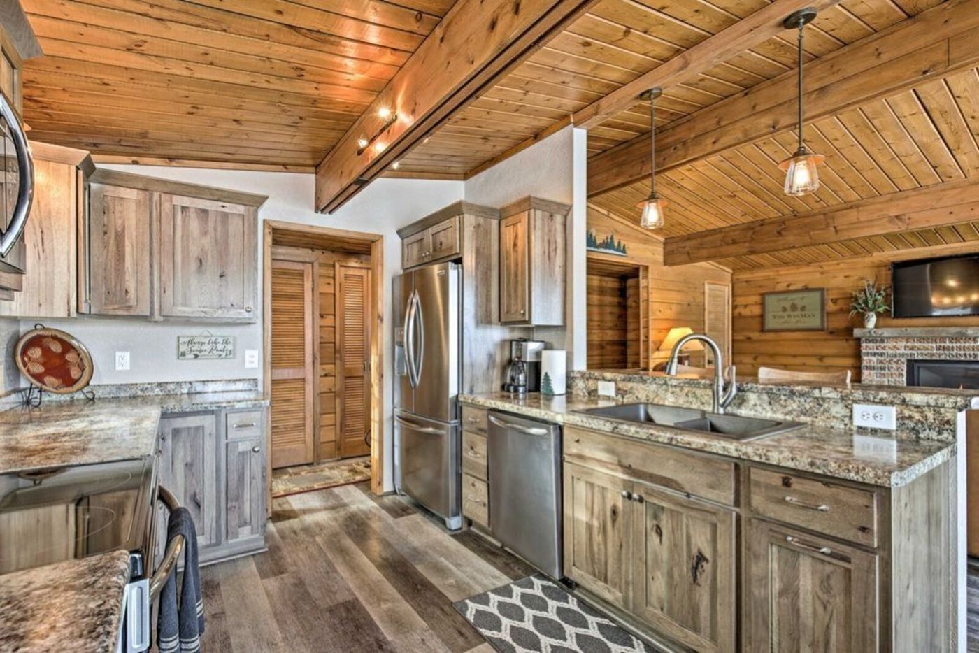 Remodeled kitchen with granite counters and stainless appliances